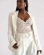 PLERIVA Breathable Lace V-Neck Bodysuit in White, styled with a blazer and trousers