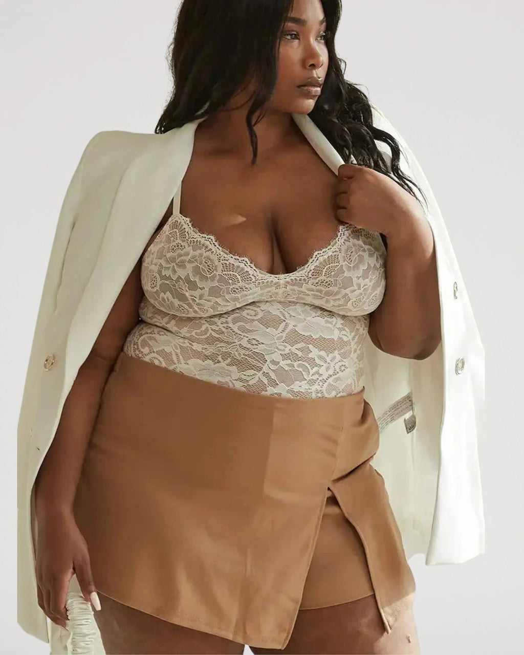 PLERIVA Breathable Lace V-Neck Bodysuit in White, styled with a blazer and skirt