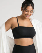 PLERIVA Convertible Invisible Support Bra in Black, worn with straps under an open shirt
