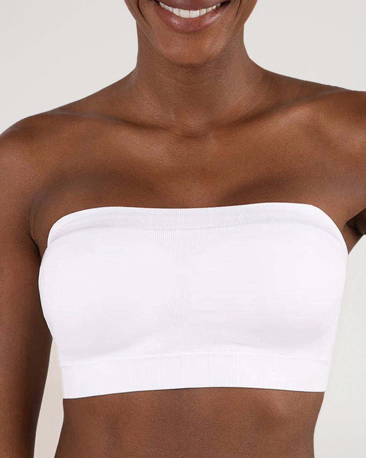 PLERIVA Convertible Invisible Support Bra in White, strapless front view on model