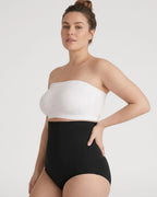 PLERIVA Convertible Invisible Support Bra in White, strapless view with a black shaping brief
