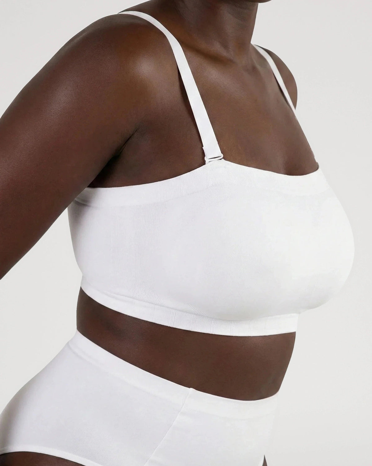 PLERIVA Convertible Invisible Support Bra in White, worn with straps, side view