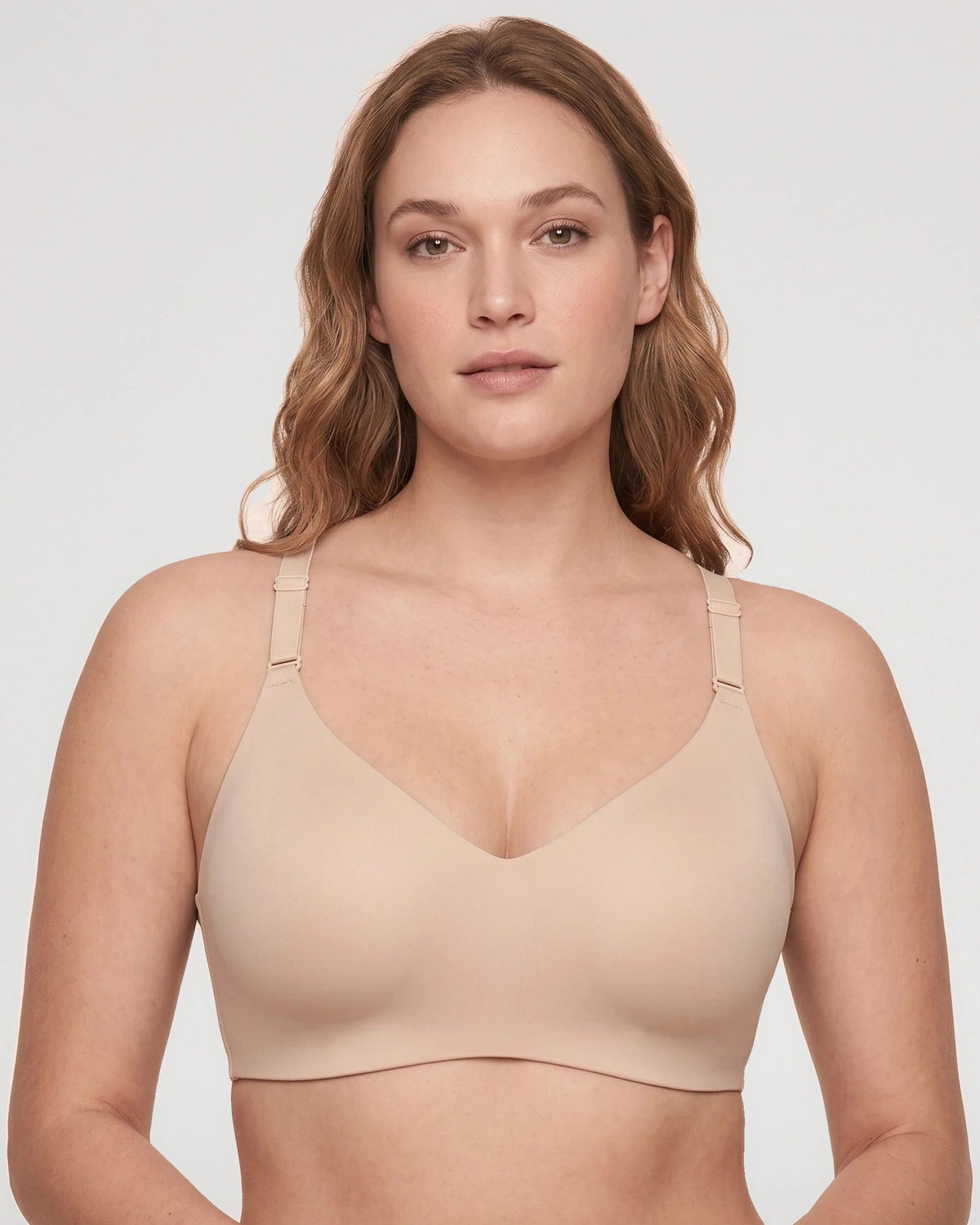 PLERIVA Deep V Lace Racerback Bralette in Beige, front view on model
