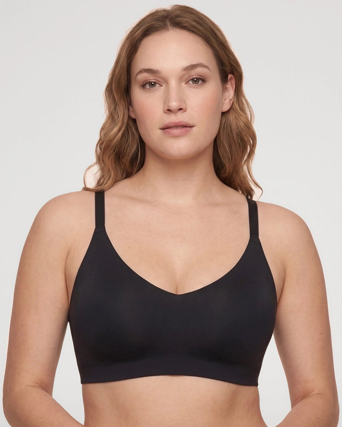 PLERIVA Deep V Lace Racerback Bralette in Black, front view on model