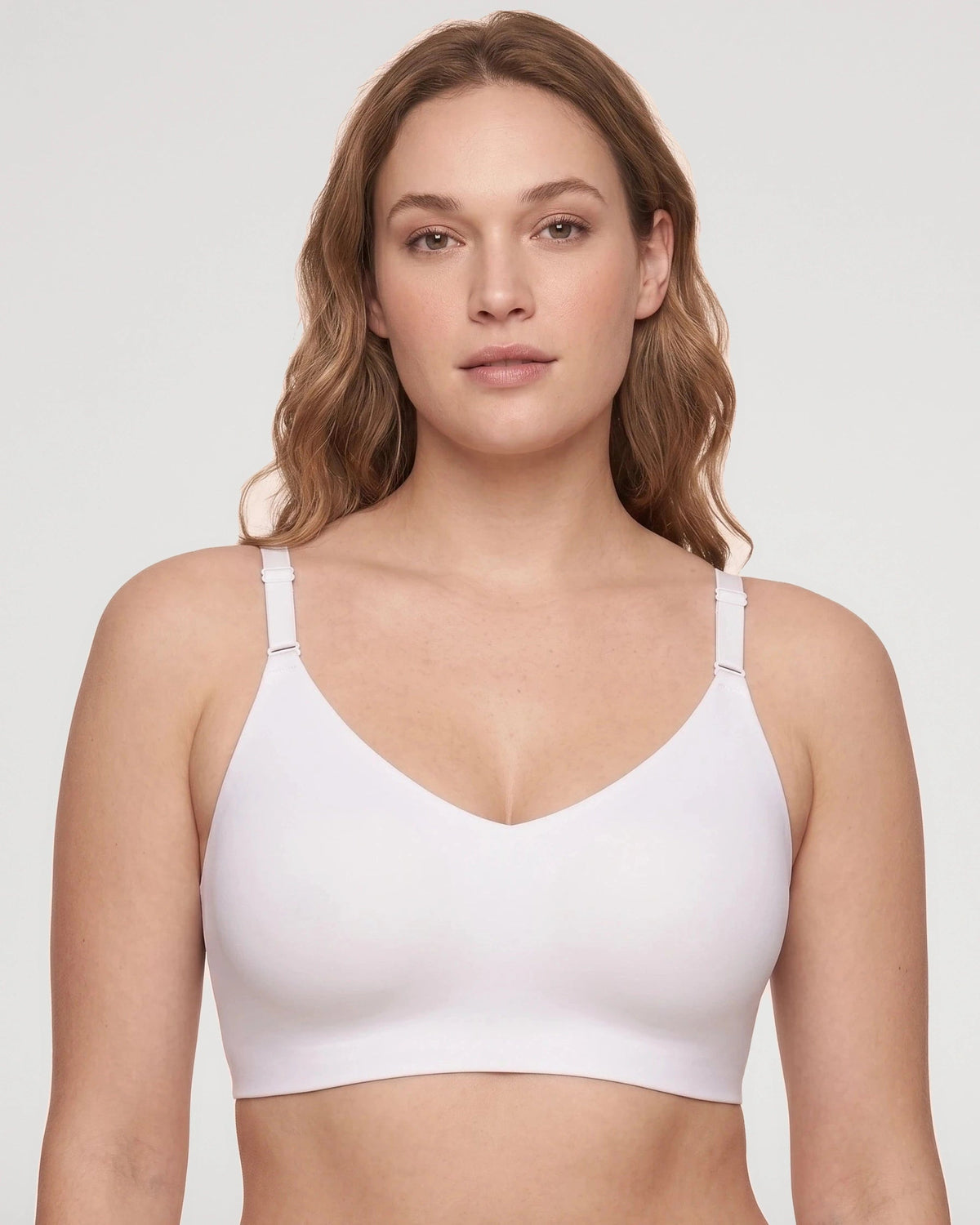 PLERIVA Deep V Lace Racerback Bralette in White, front view on model