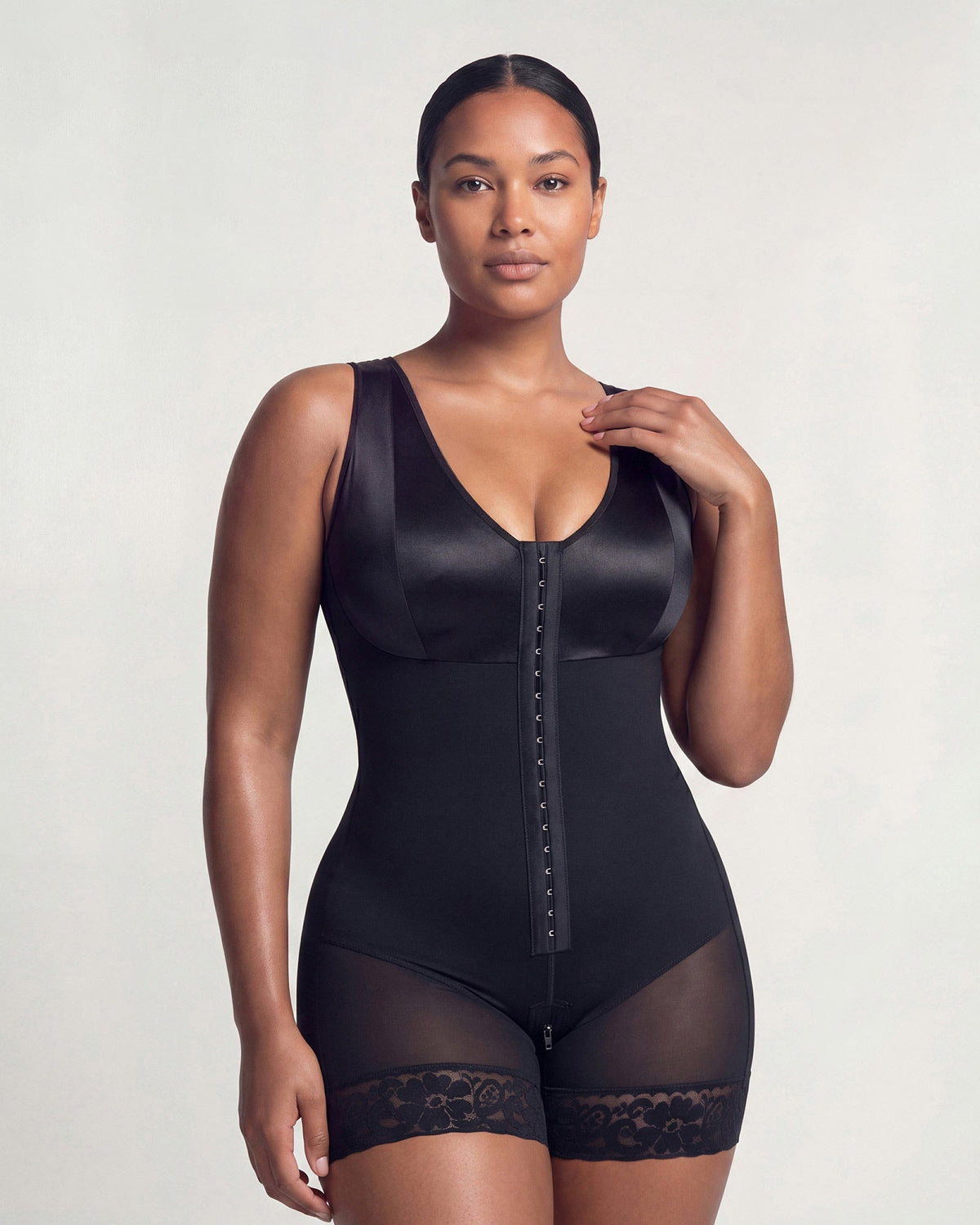 PLERIVA Extra Firm Full Body Post Surgery Shaper in Black, front view on model