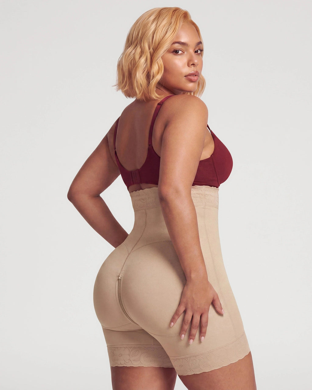 PLERIVA High Waist Tummy Control Sculpting Shorts in Nude, back three-quarter view on model