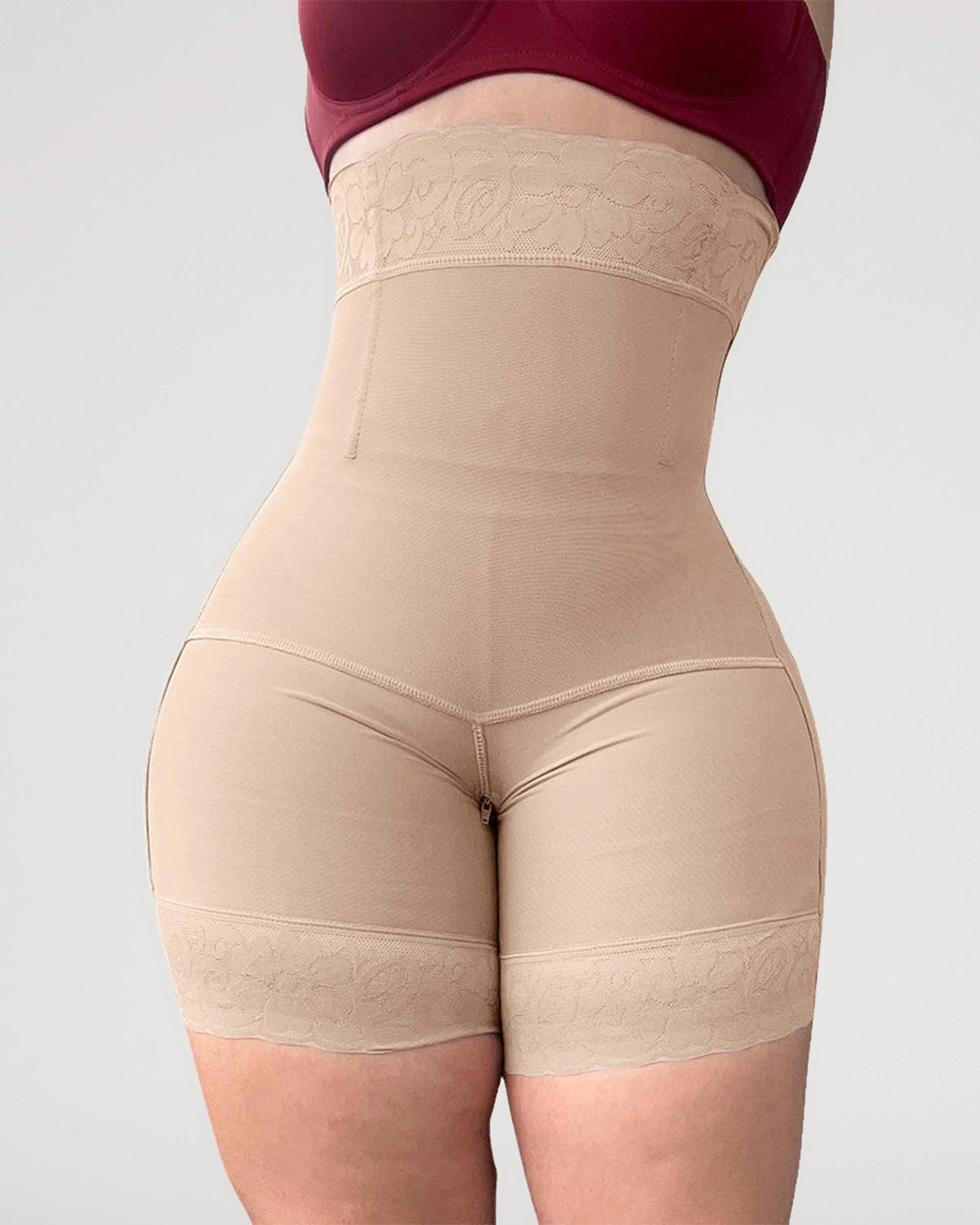 PLERIVA High Waist Tummy Control Sculpting Shorts in Nude, front close-up of the hips and thighs