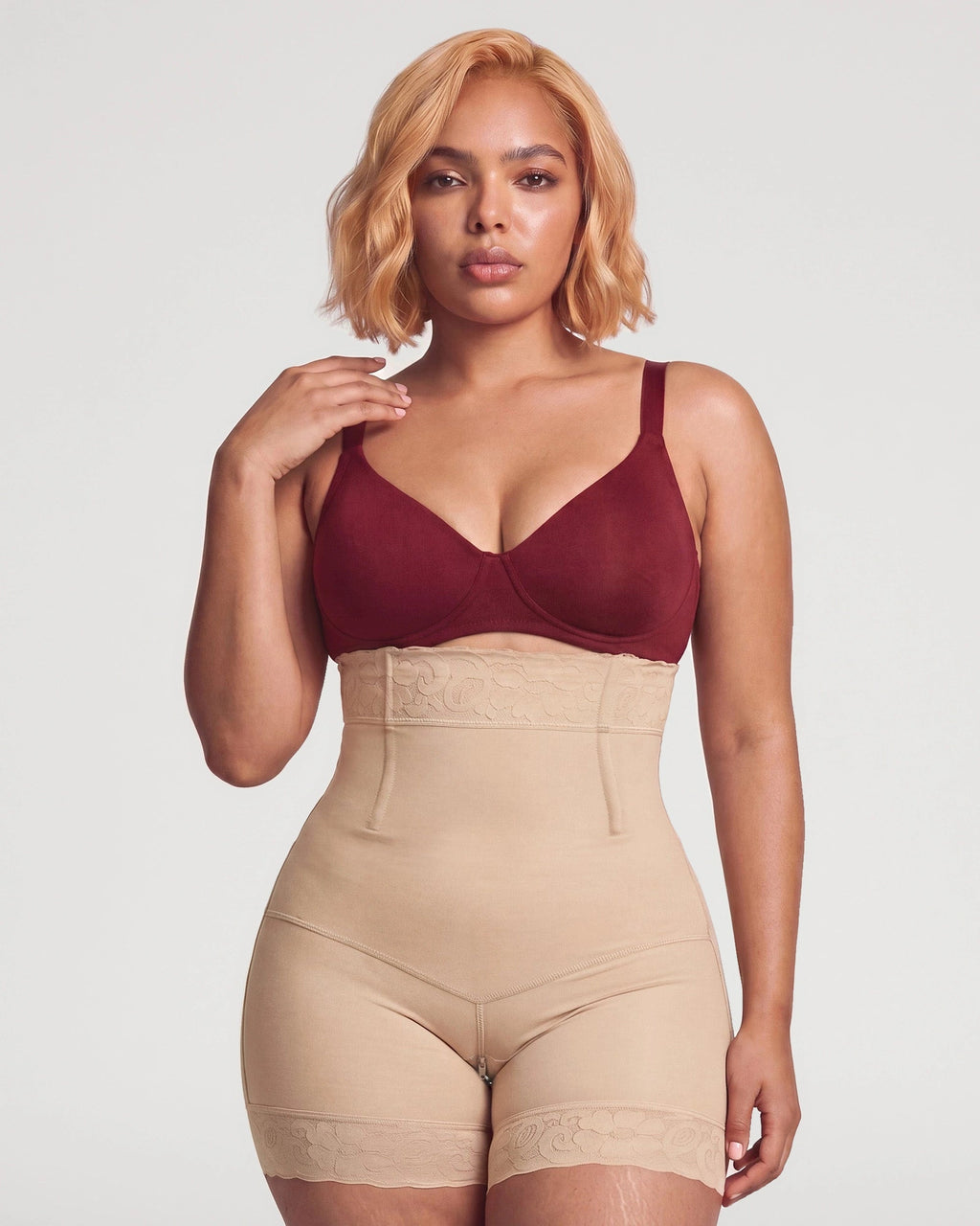 PLERIVA High Waist Tummy Control Sculpting Shorts in Nude, front view on model