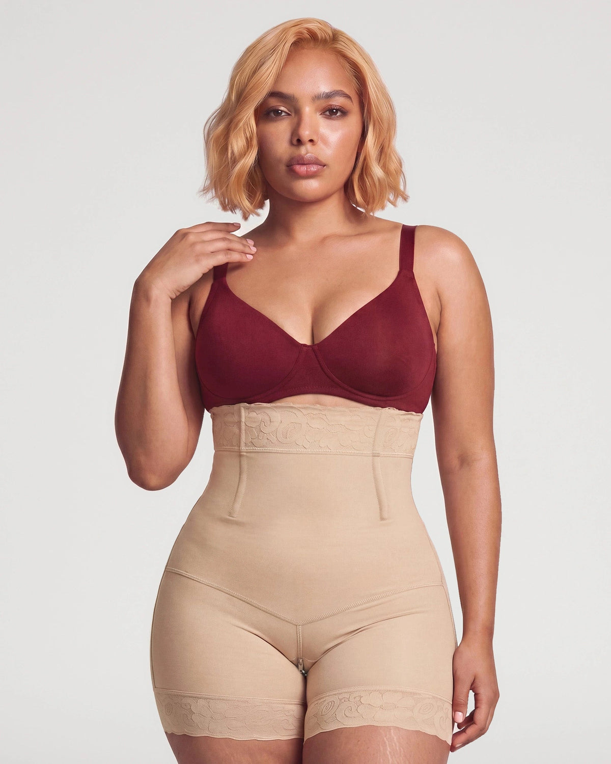 PLERIVA High Waist Tummy Control Sculpting Shorts in Nude, front view on model