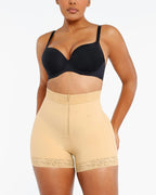 PLERIVA Lace Steel Boned Tummy Control Shorts in Beige, standing front view on model
