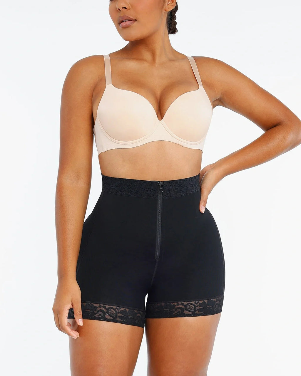 PLERIVA Lace Steel Boned Tummy Control Shorts in Black, front view with hand on hip