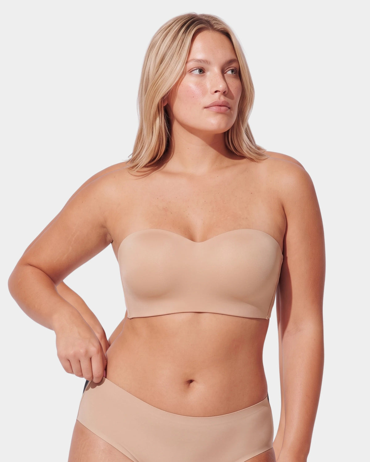 PLERIVA Molded Strapless Underwire Bandeau in Nude, strapless front view on model