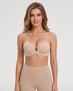 PLERIVA Padded Strapless Bra with Front Closure in Nude, front view on model with arms relaxed