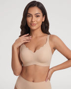 PLERIVA Scalloped Wireless Lift Bra in Nude, front view on model