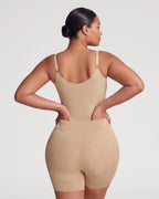 PLERIVA Seamless Full Body Sculpting Bodysuit in Nude, back view on model