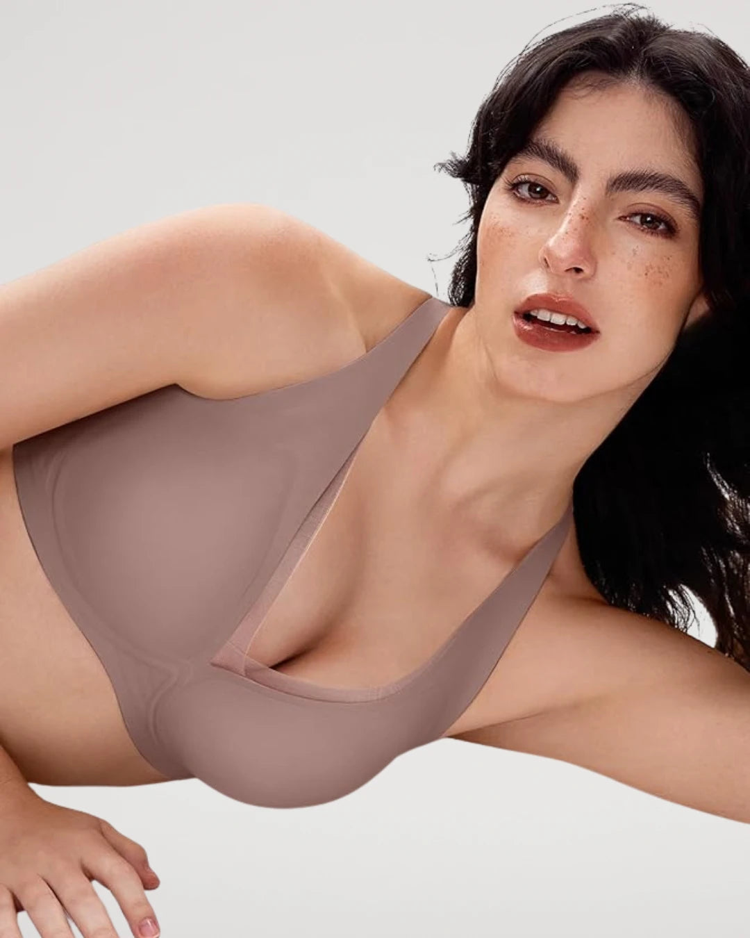 PLERIVA Seamless Mesh Wireless Plunge Lift Bra in Gray, lifestyle shot on model