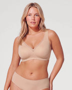 PLERIVA Seamless Mesh Wireless Plunge Lift Bra in Nude, front view on model