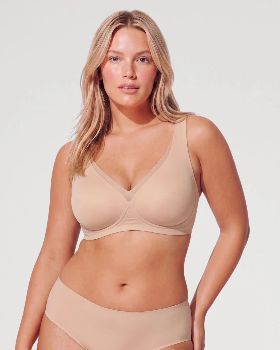 PLERIVA Seamless Mesh Wireless Plunge Lift Bra in Nude, front view on model