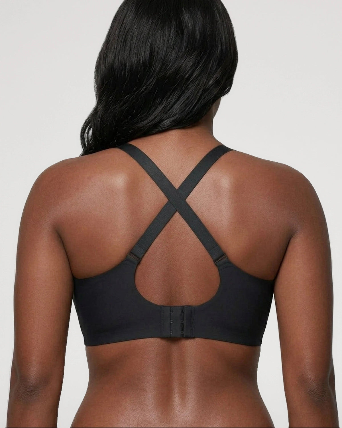 PLERIVA Seamless Scalloped Wireless Bra in Black, back view showing the crossover straps