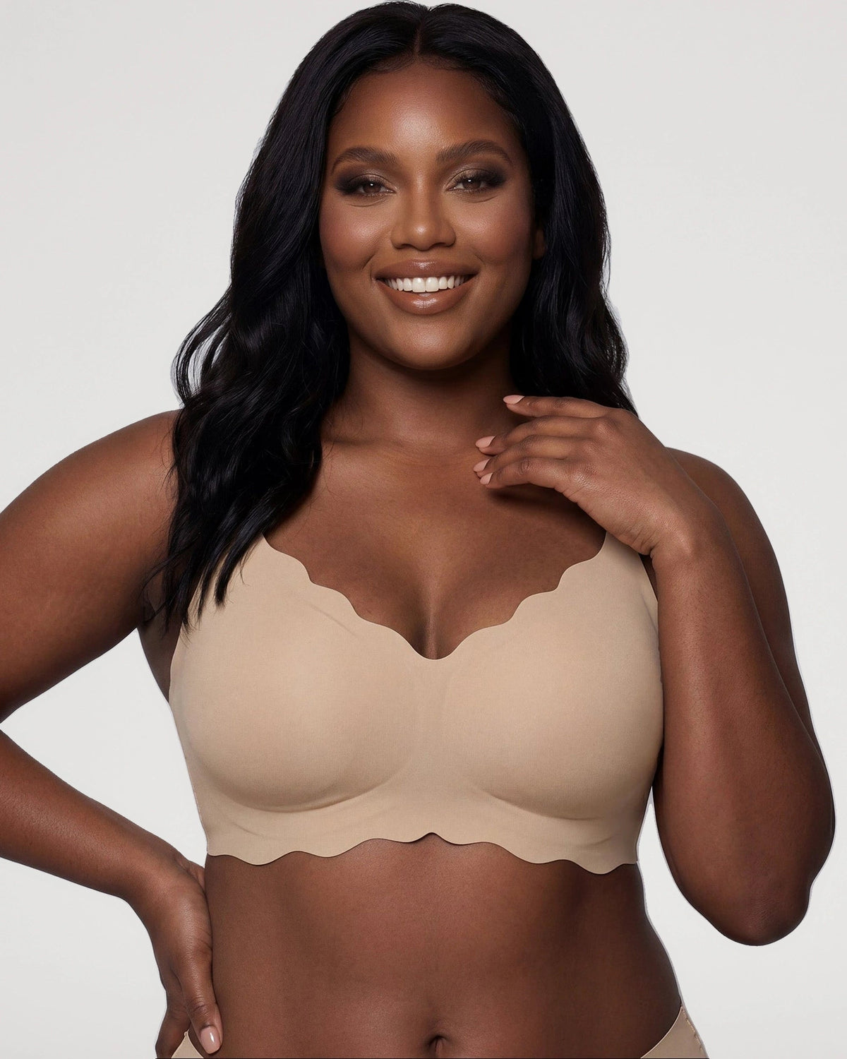 PLERIVA Seamless Scalloped Wireless Bra in Nude, front view on model