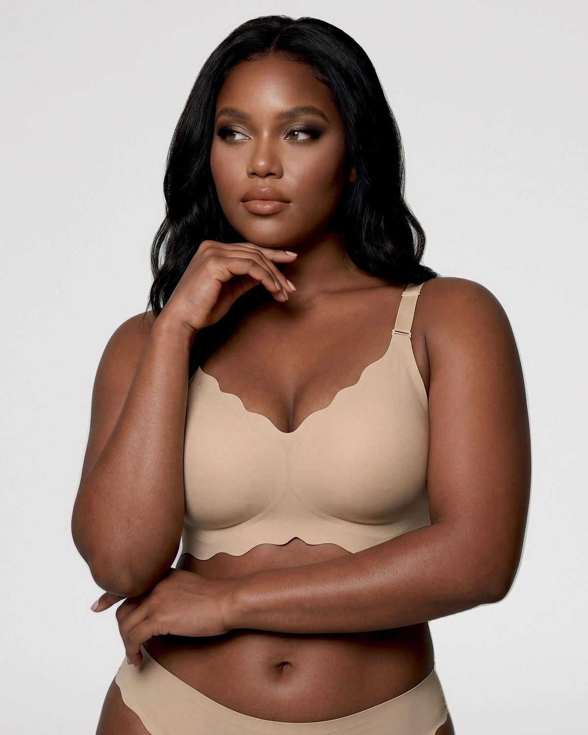 PLERIVA Seamless Scalloped Wireless Bra in Nude, three-quarter view on model