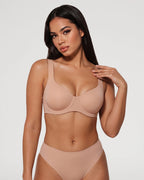 PLERIVA Seamless Unlined Underwire Balconette Bra in Nude, front view on model