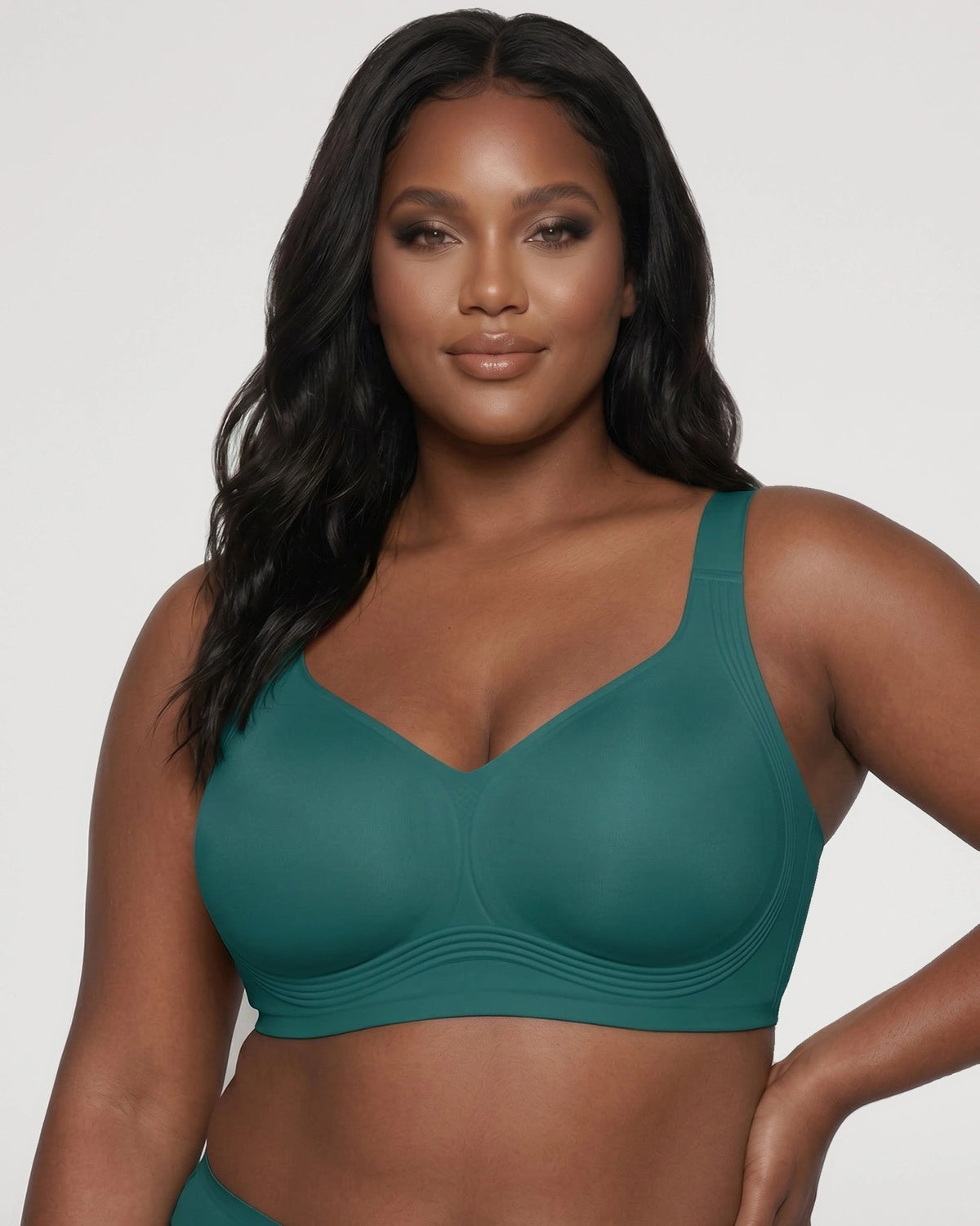 PLERIVA Seamless Wireless Full Coverage Lift Bra in Emerald Green, front view on model