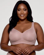 PLERIVA Seamless Wireless Full Coverage Lift Bra in Nude Pink, front view on a curvy model