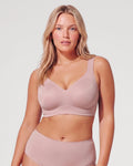 PLERIVA Seamless Wireless Full Coverage Lift Bra in Nude Pink, front view on model