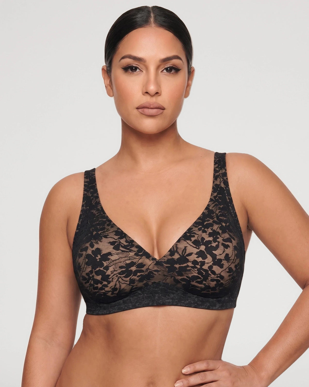 PLERIVA Seamless Wireless Plunge Lift Bra in Black Nude, front view on model