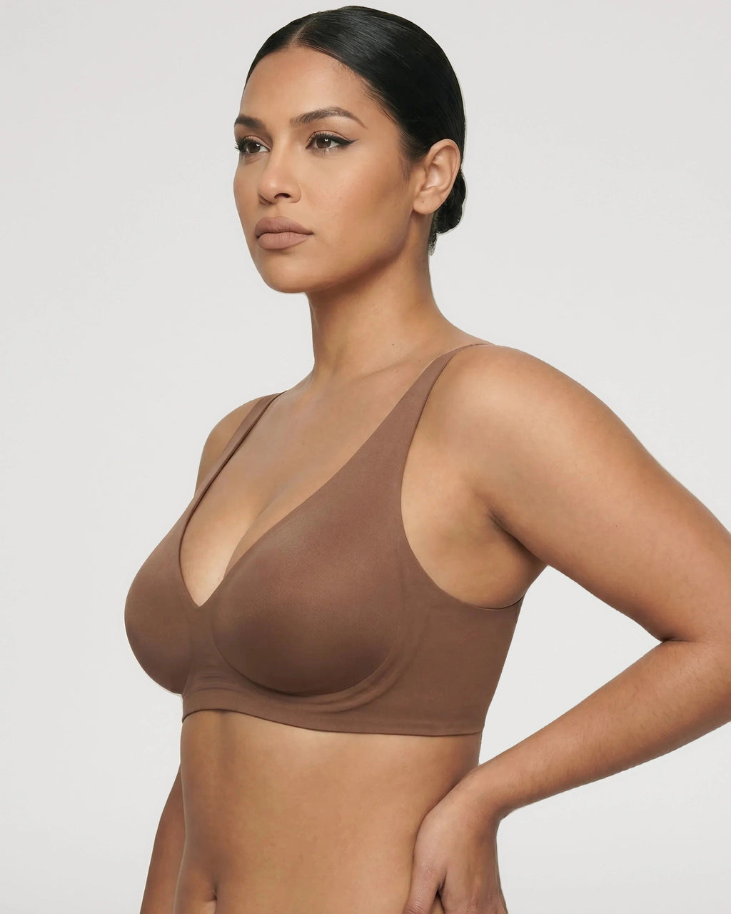 PLERIVA Seamless Wireless Plunge Lift Bra in Coffee, side view on model