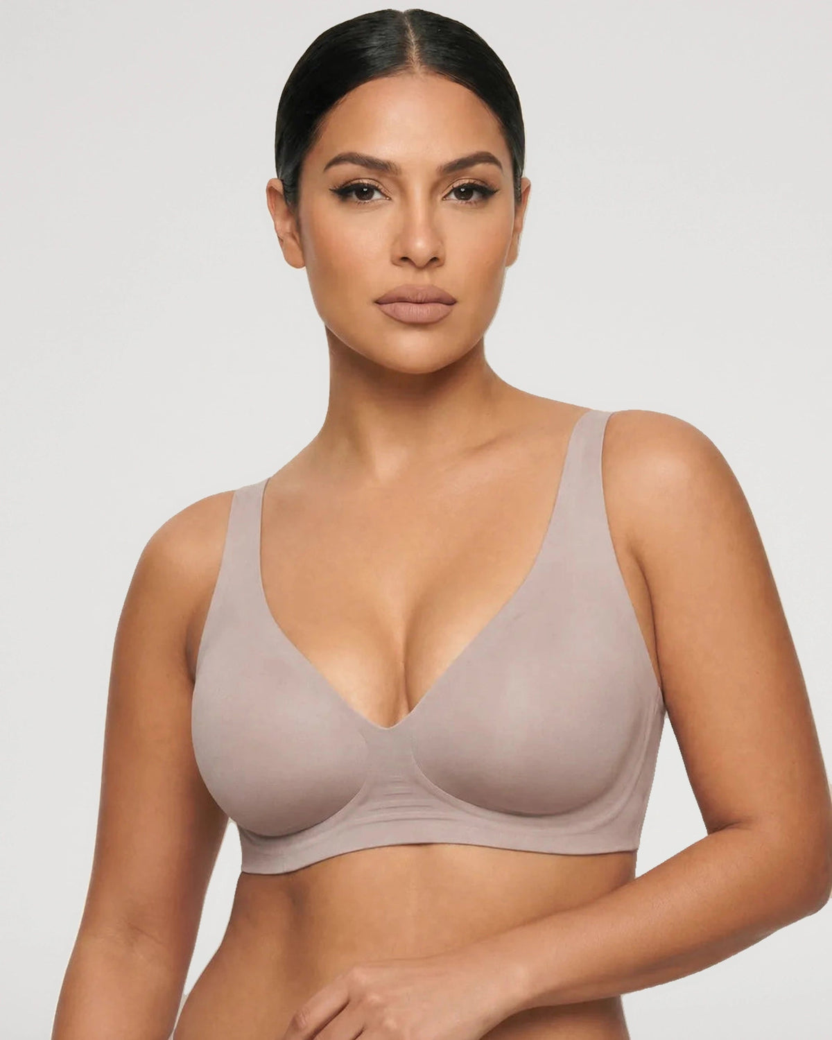PLERIVA Seamless Wireless Plunge Lift Bra in Gray, front view on model