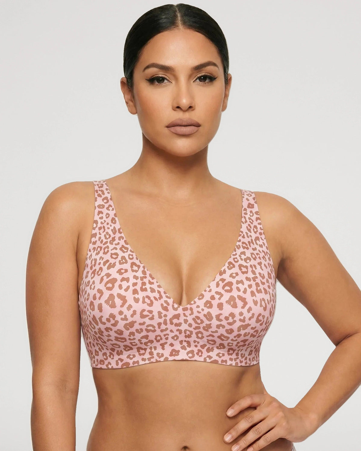 PLERIVA Seamless Wireless Plunge Lift Bra in Light Leopard, front view on model