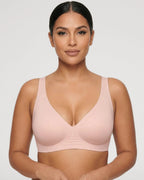 PLERIVA Seamless Wireless Plunge Lift Bra in Nude Pink, front view on model