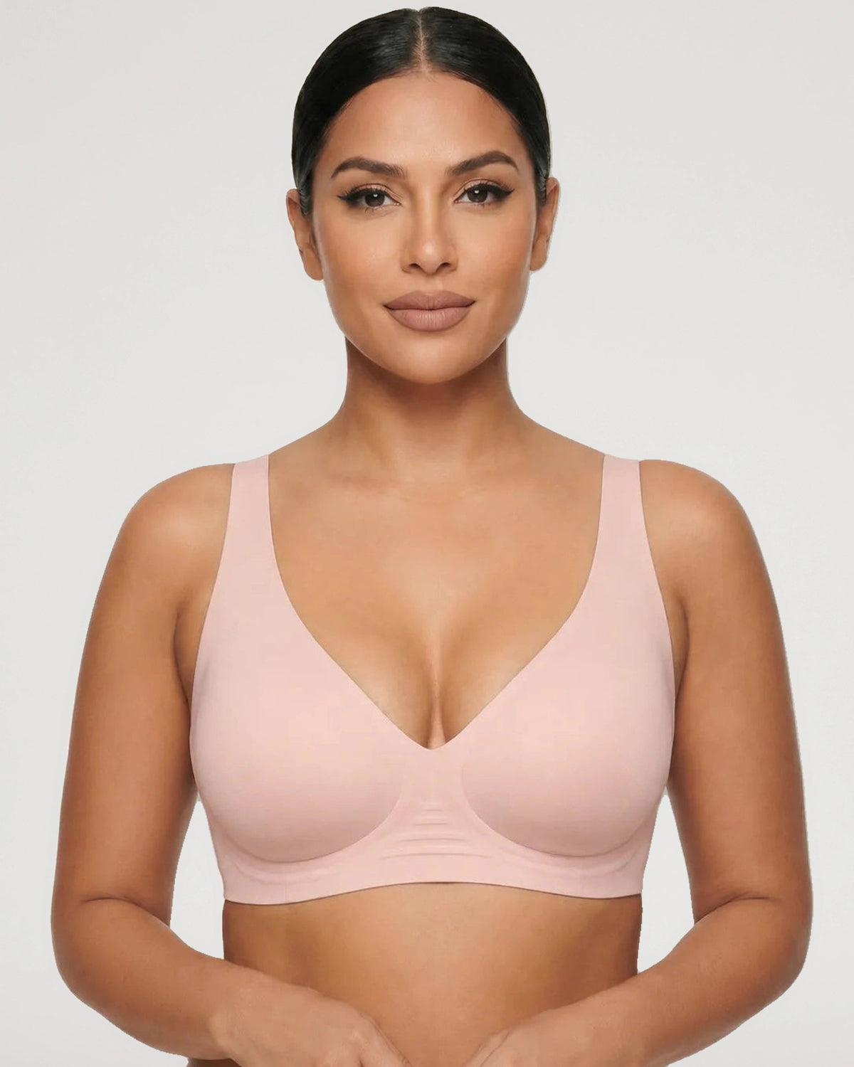 PLERIVA Seamless Wireless Plunge Lift Bra in Nude Pink, front view on model