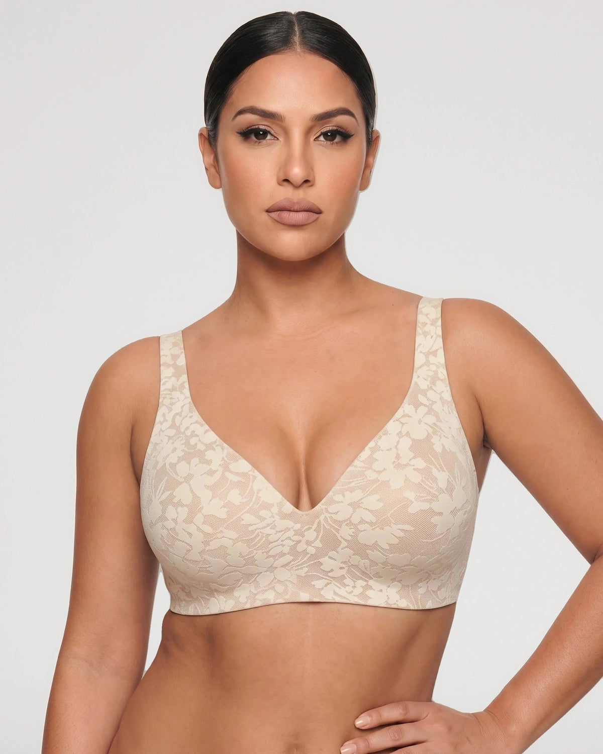 PLERIVA Seamless Wireless Plunge Lift Bra in Sheer Ivory, front view on model