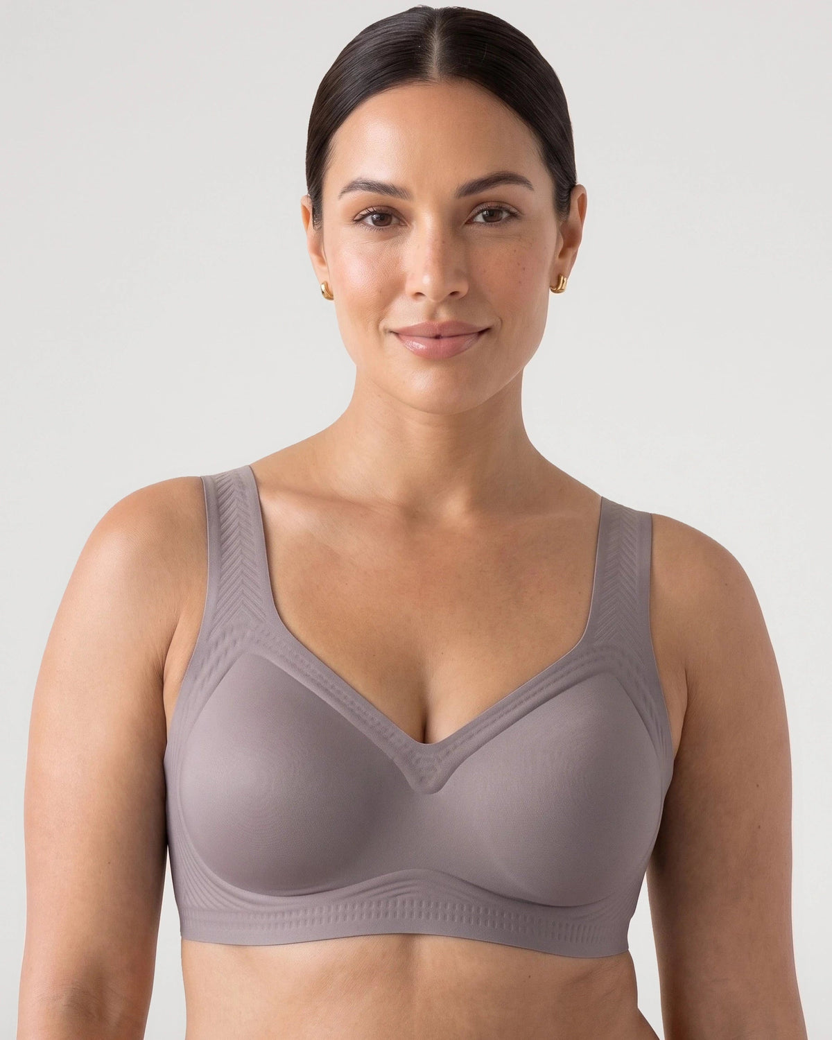 PLERIVA Smooth Back Full Coverage Wireless Bra in Gray, front view on model