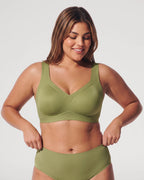 PLERIVA Smooth Back Full Coverage Wireless Bra in Light Green, front view on model with matching briefs