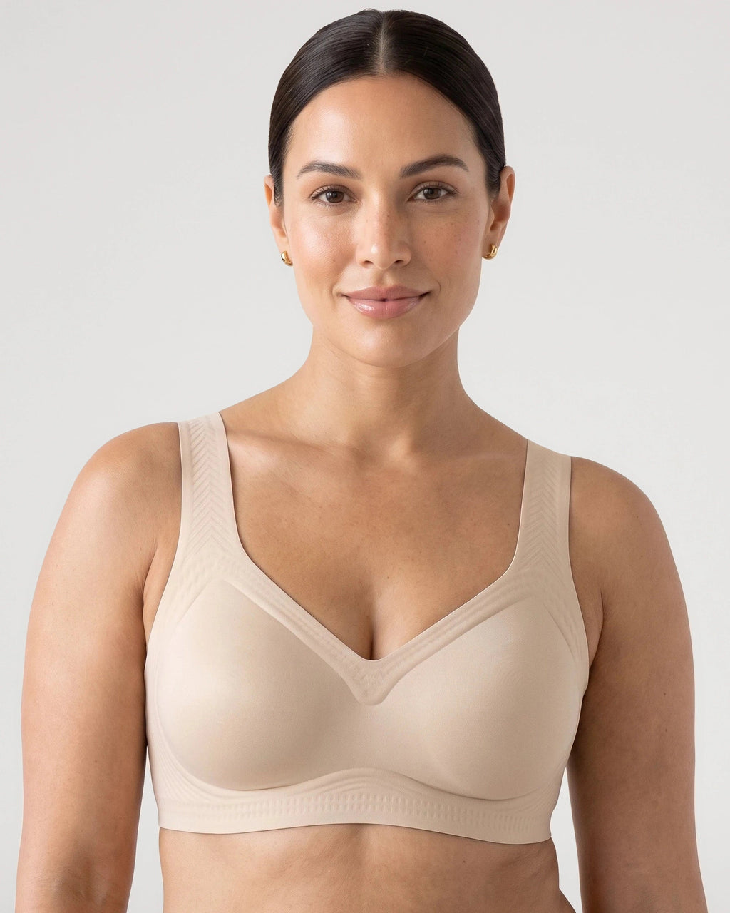PLERIVA Smooth Back Full Coverage Wireless Bra in Nude, front view on model