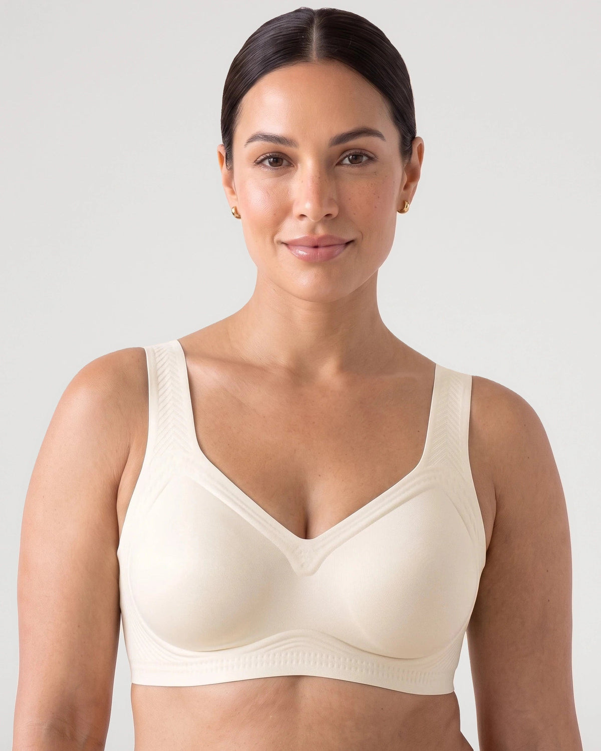 PLERIVA Smooth Back Full Coverage Wireless Bra in White, front view on model