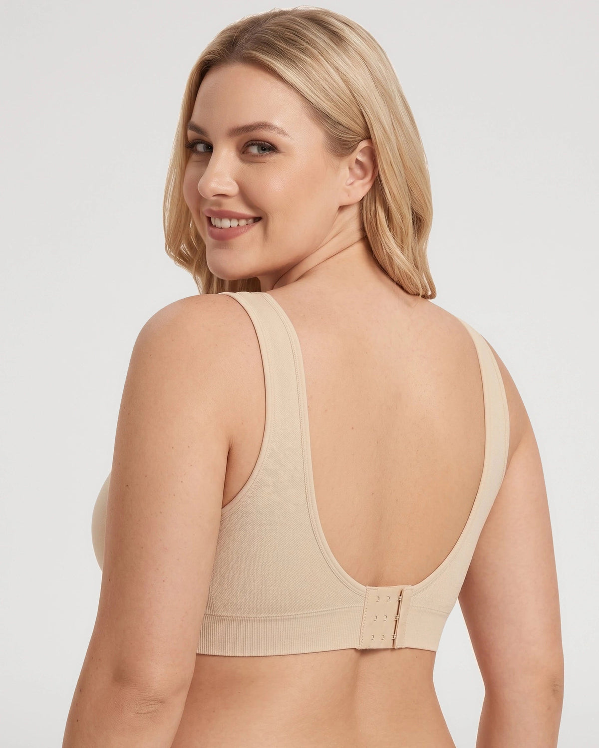 PLERIVA U-Back Wireless Lift and Coverage Bra in Nude, back view looking over the shoulder