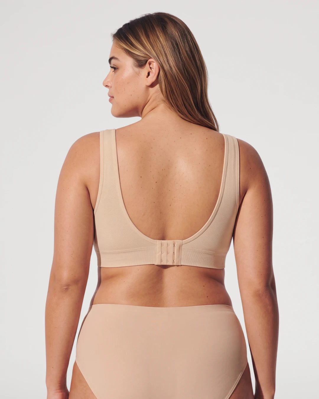 PLERIVA U-Back Wireless Lift and Coverage Bra in Nude, back view showing the U-back and hook-and-eye closure