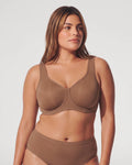 PLERIVA Unlined Full Coverage Underwire Bra in Gravel Beige, front view on model with matching brief