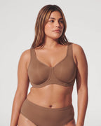 PLERIVA Unlined Full Coverage Underwire Bra in Gravel Beige, front view on model with matching brief