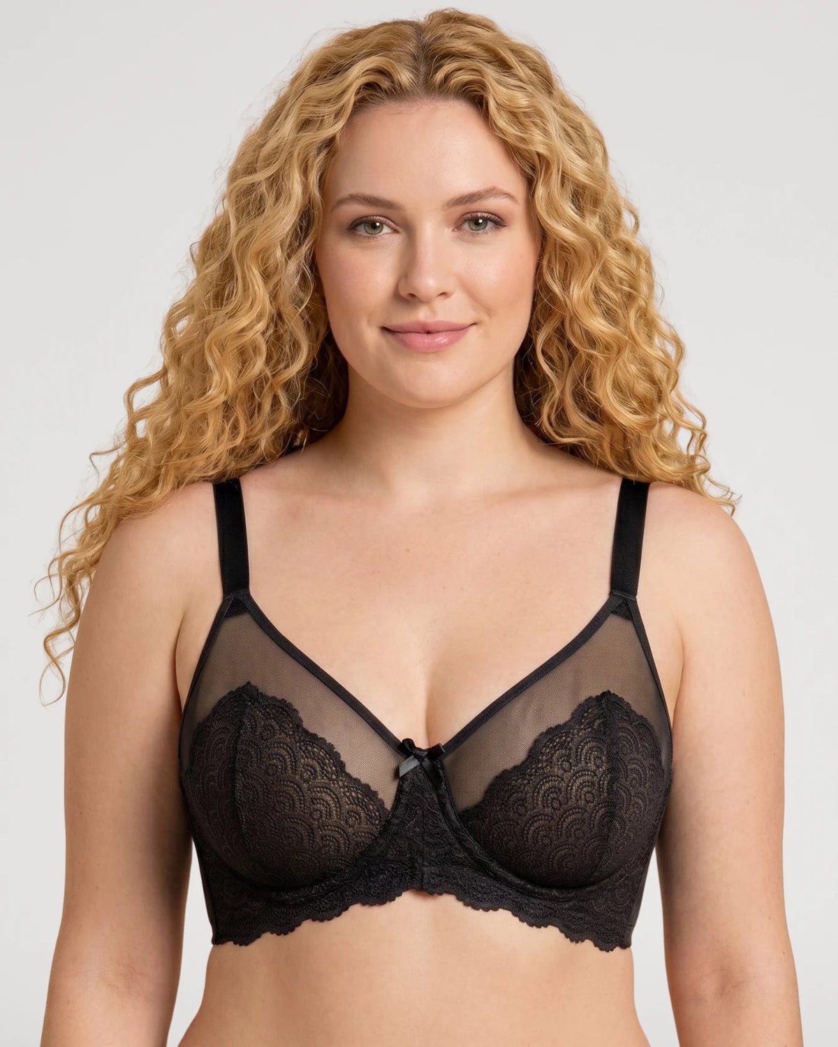 PLERIVA Unlined Lace Underwire Minimizer Bra in Black, front view on model