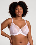 PLERIVA Unlined Lace Underwire Minimizer Bra in White, front view on model with hand on hip