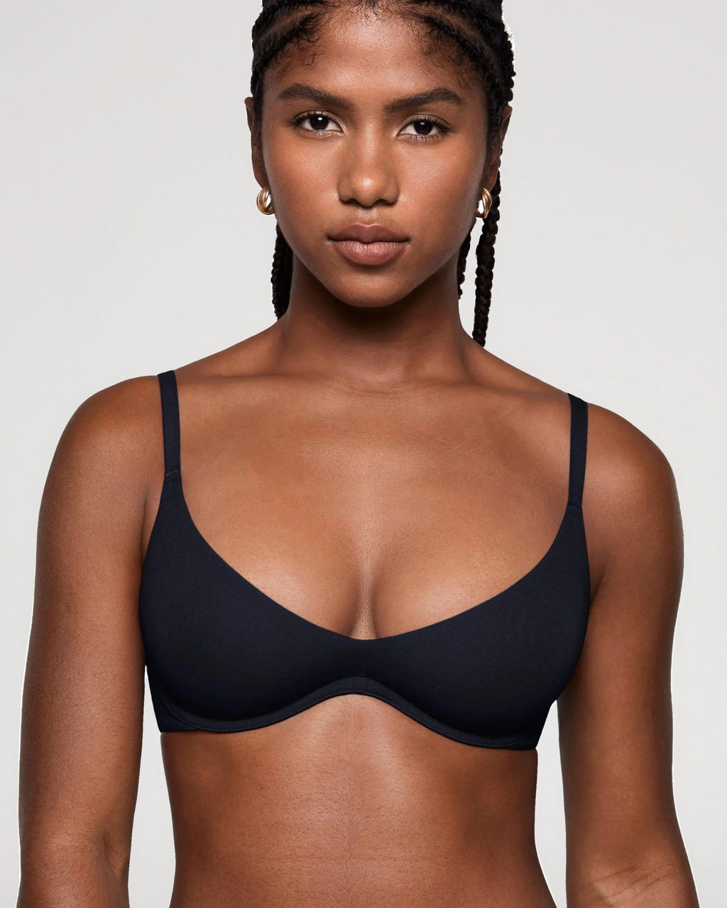PLERIVA Unlined Plunge Balconette Bra in Black, front view on model