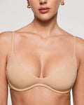 PLERIVA Unlined Plunge Balconette Bra in Nude, front close-up on model