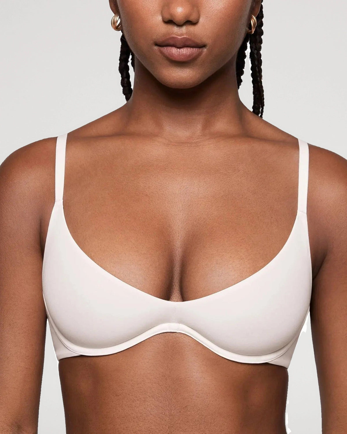 PLERIVA Unlined Plunge Balconette Bra in White, front close-up on model